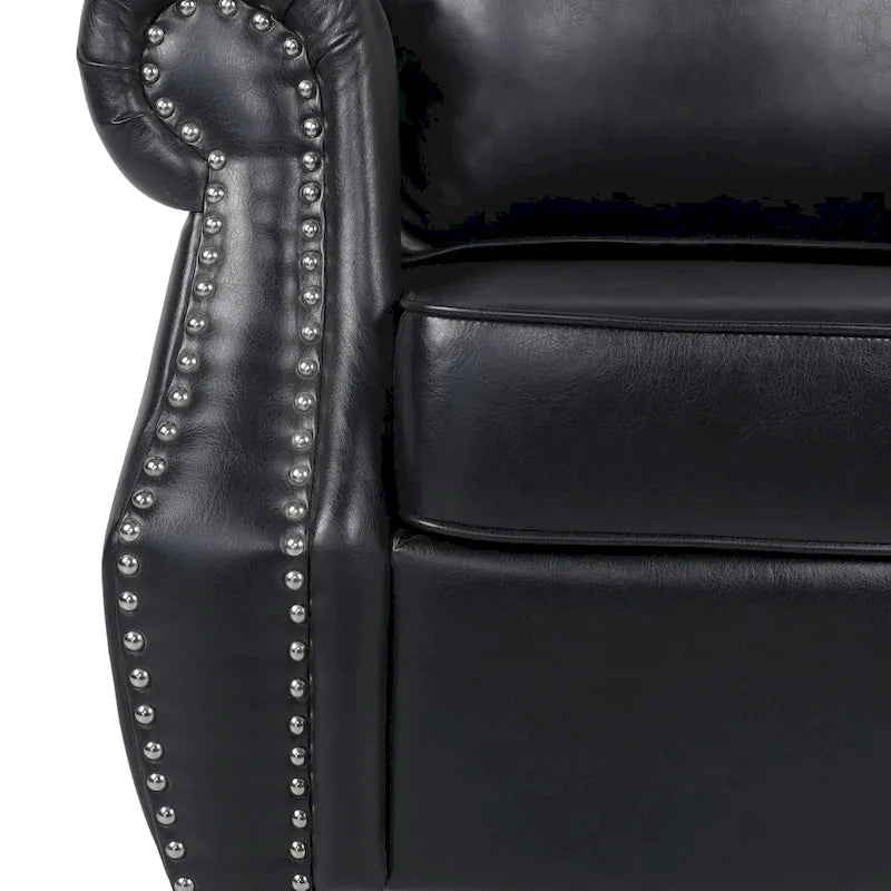 Fauteuil de club en similicuir avec clous de tapissier